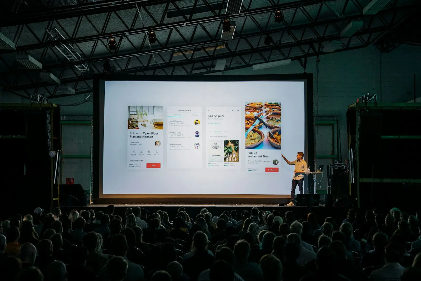 Speaker presenting on a conference stage